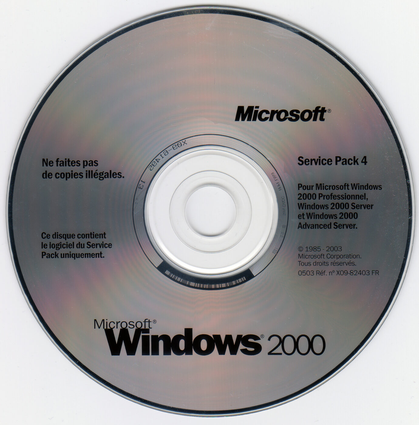 A Windows 2000 installation compact disc with French-language labelling, marked Service Pack 4.