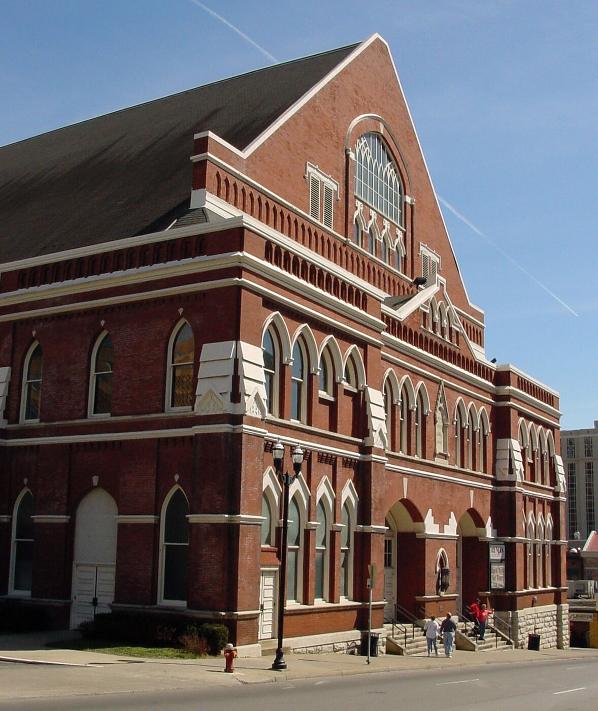 Exterior of the Ryman Auditorium, a red-brick building with rows of arched windows.