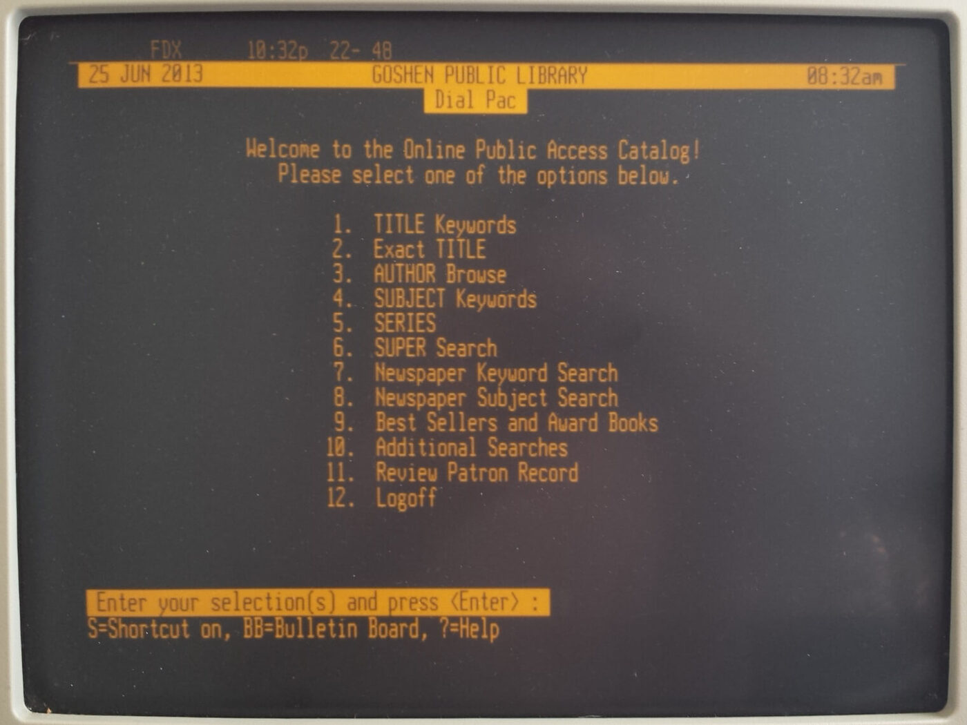 A monochrome character-mode terminal screen showing a numbered menu of library catalogue and circulation options.