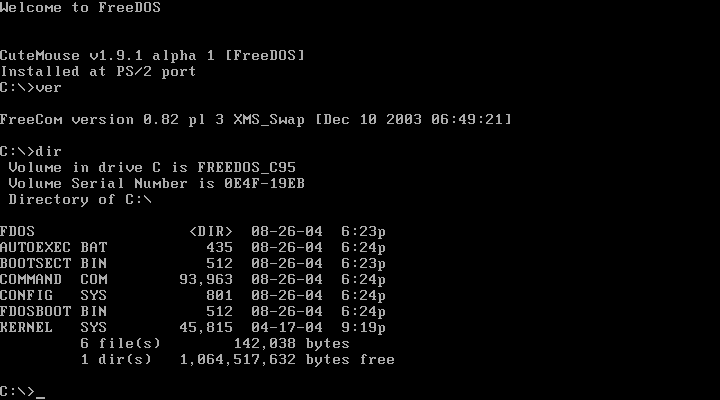 A monochrome DOS screen: a version banner for FreeCom 0.82, then a DIR listing of drive C showing FDOS, AUTOEXEC.BAT, BOOTSECT.BIN, COMMAND.COM, CONFIG.SYS, FDOSBOOT.BIN and KERNEL.SYS with sizes and dates.
