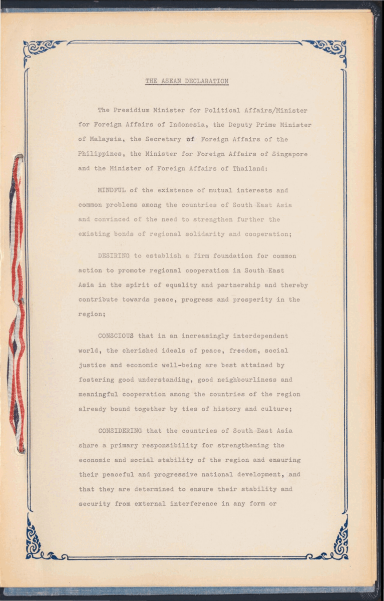 First page of the bound original ASEAN Declaration: typewritten text inside a printed blue border, headed THE ASEAN DECLARATION, with a red, white and blue binding ribbon down the left edge.