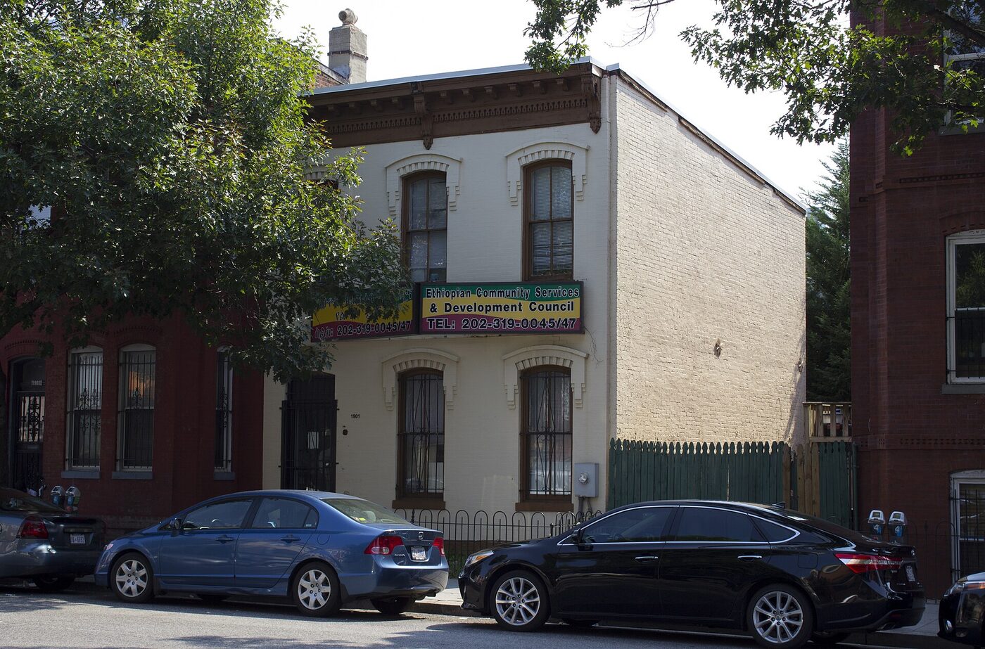A single-storey building on a Washington, DC street with a sign reading Ethiopian Community Services and Development Council.